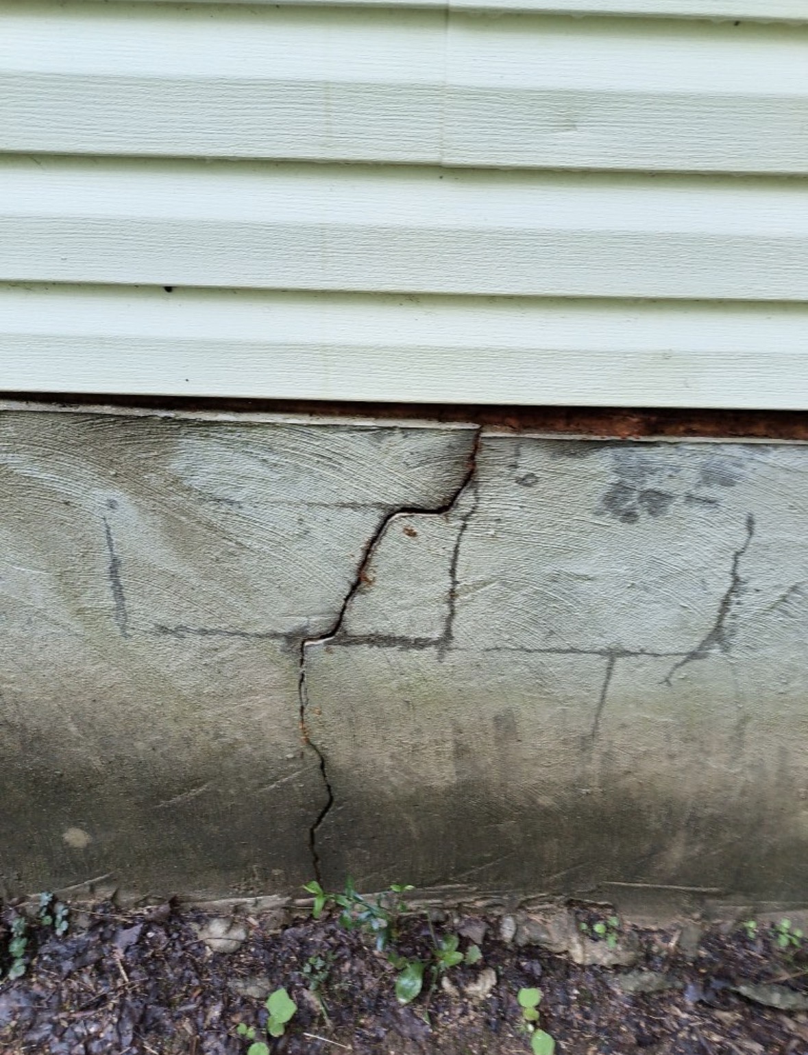 Crack observed in a foundation wall during a home inspection
