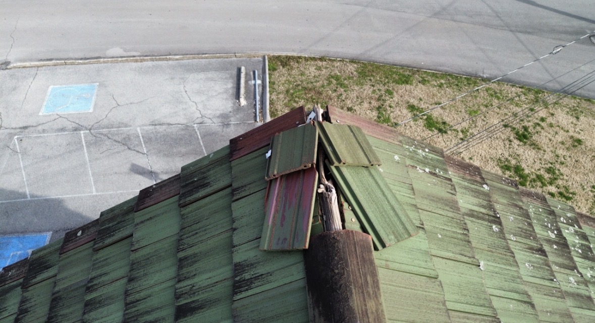 Damaged roofing observed during a home inspection in East Tennessee