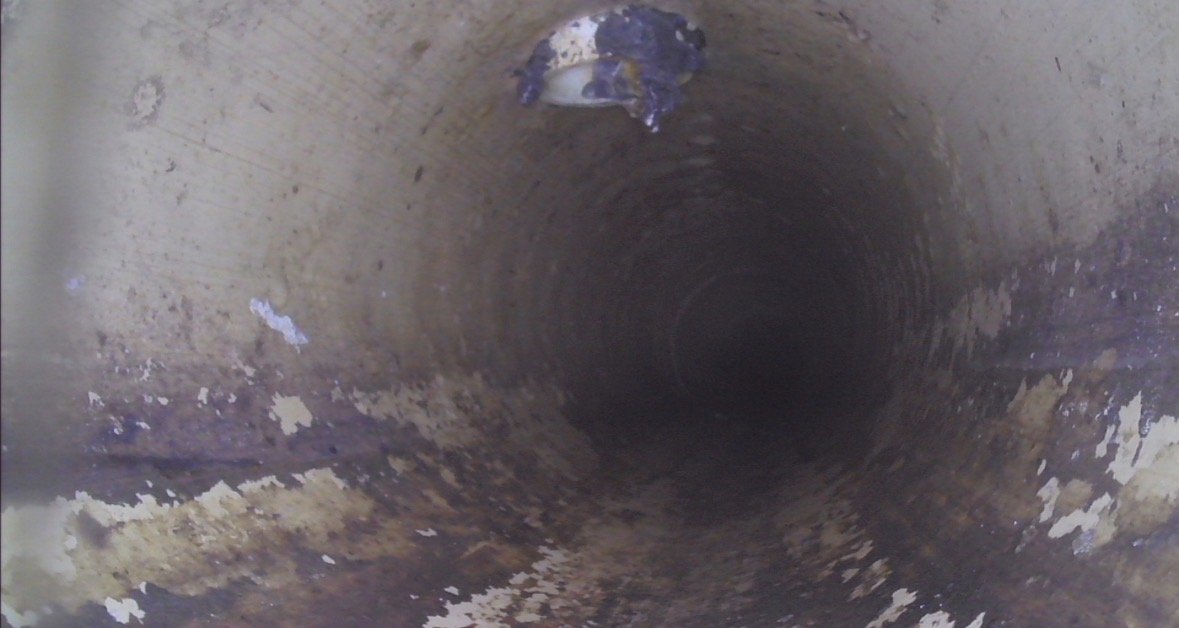 Camera view inside a main sewer line during a sewer scope inspection