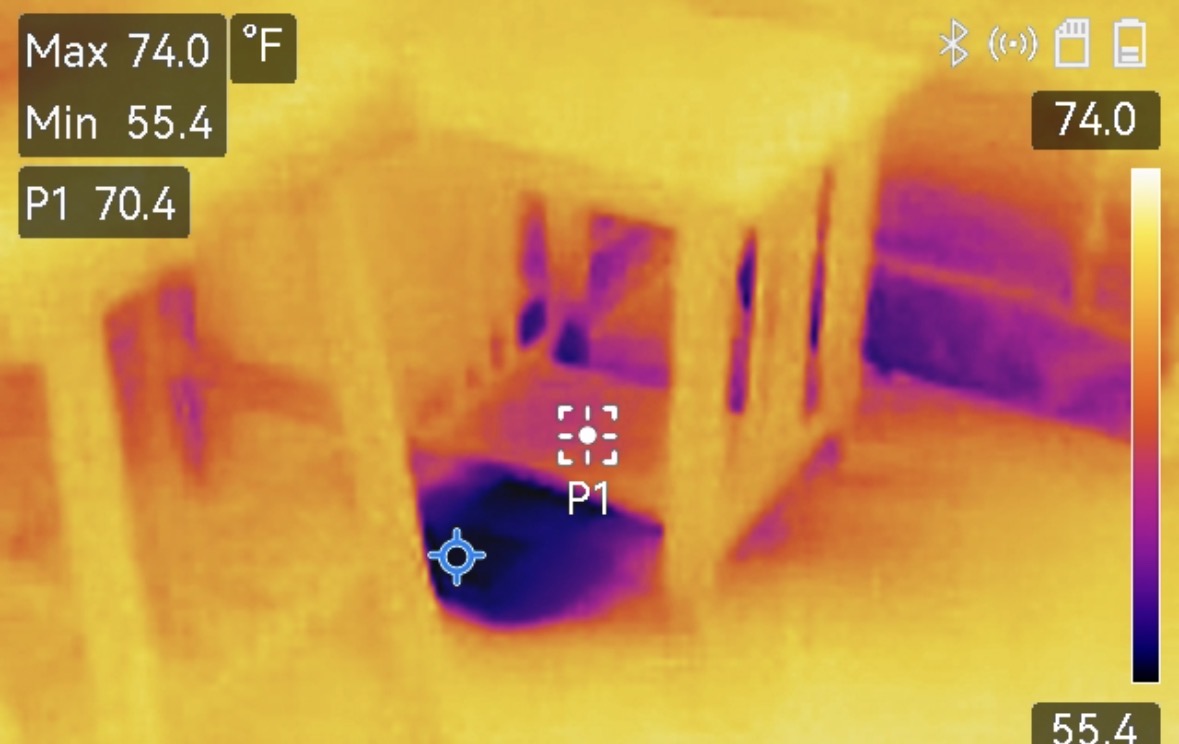 Moisture observed at a sink base cabinet with thermal imaging during a home inspection